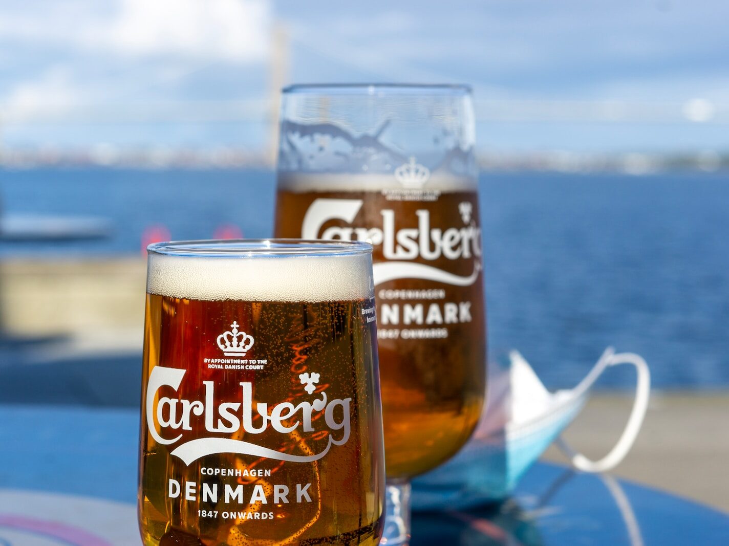 Kreml dává pod státní správu ruské dceřiné společnosti Carlsberg a Danone