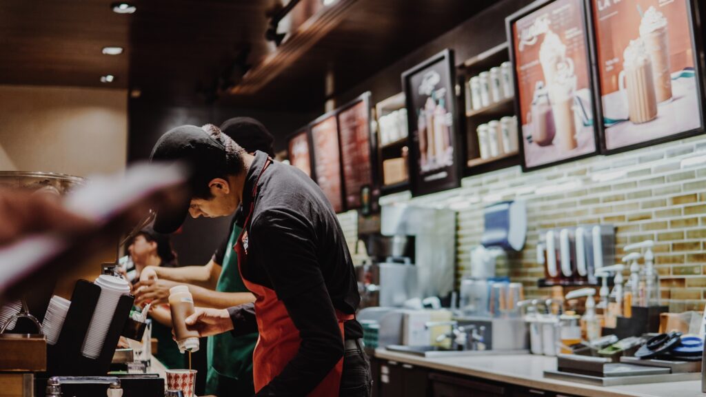 two person standing on fastfood desk