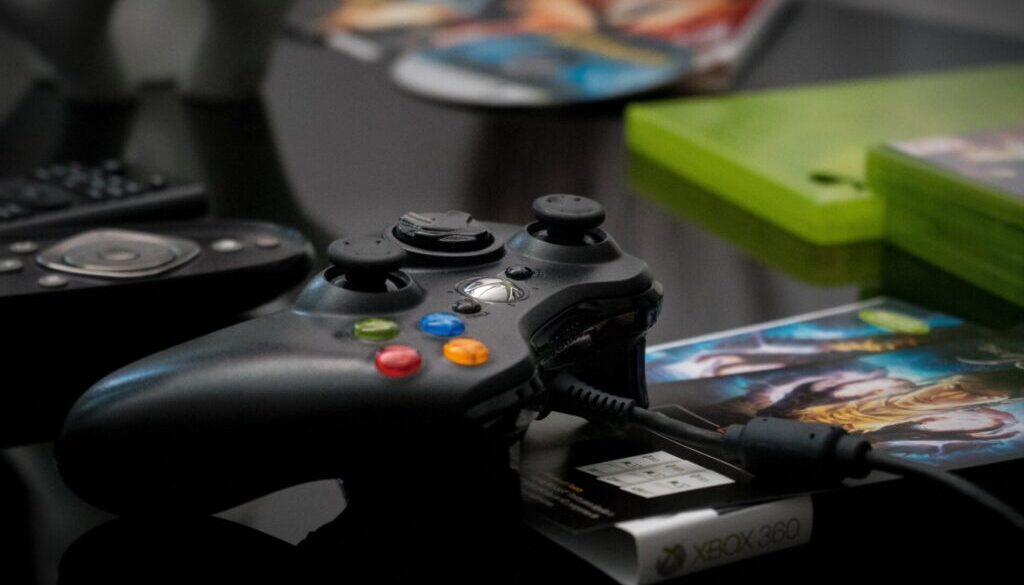 black Microsoft Xbox 360 controller