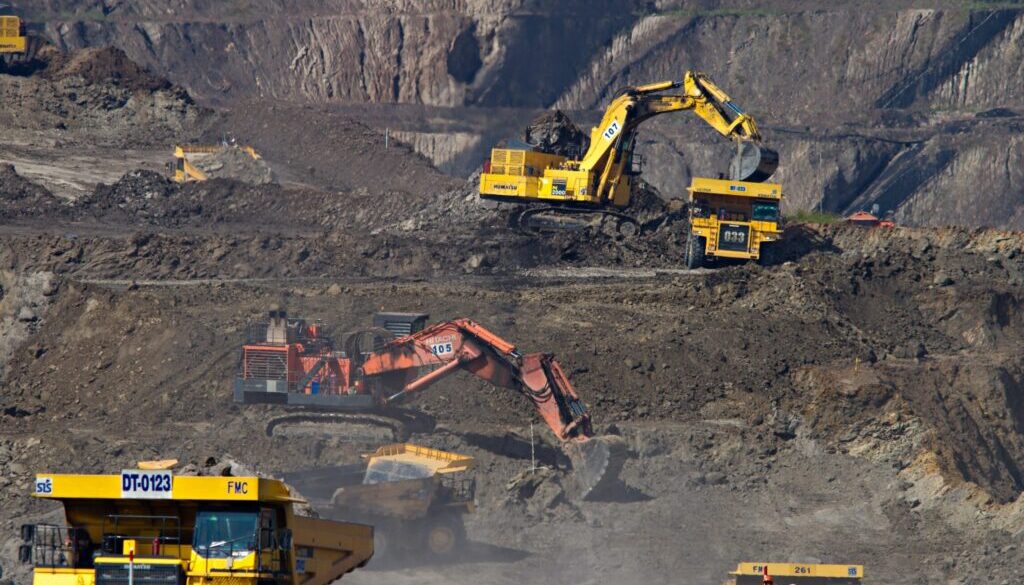 photography of excavators at mining area