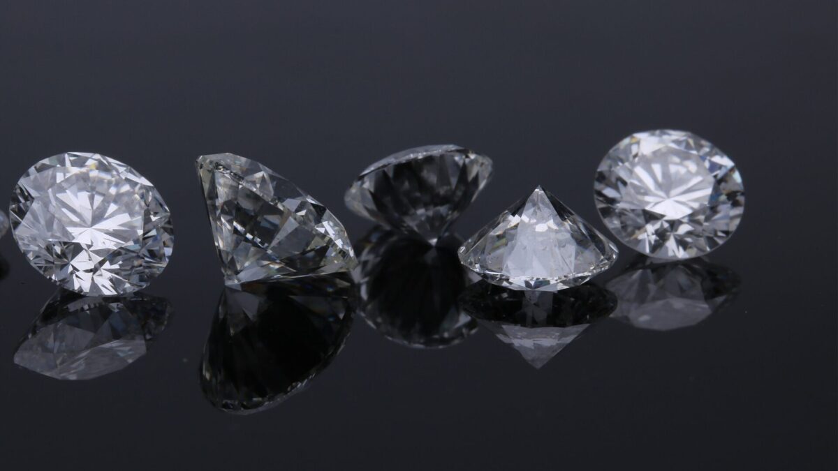 two diamond studded silver rings
