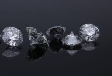two diamond studded silver rings