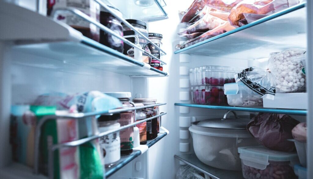 Jesse K. white refrigerator with assorted food