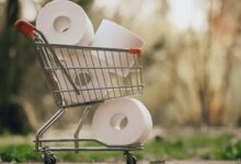 white tissue roll on stainless steel shopping cart