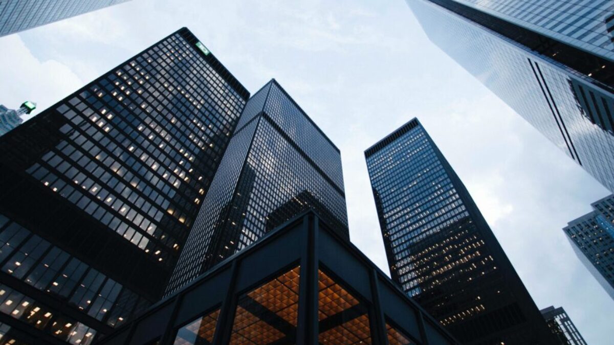 low angle photo of city high rise buildings during daytime