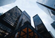 low angle photo of city high rise buildings during daytime