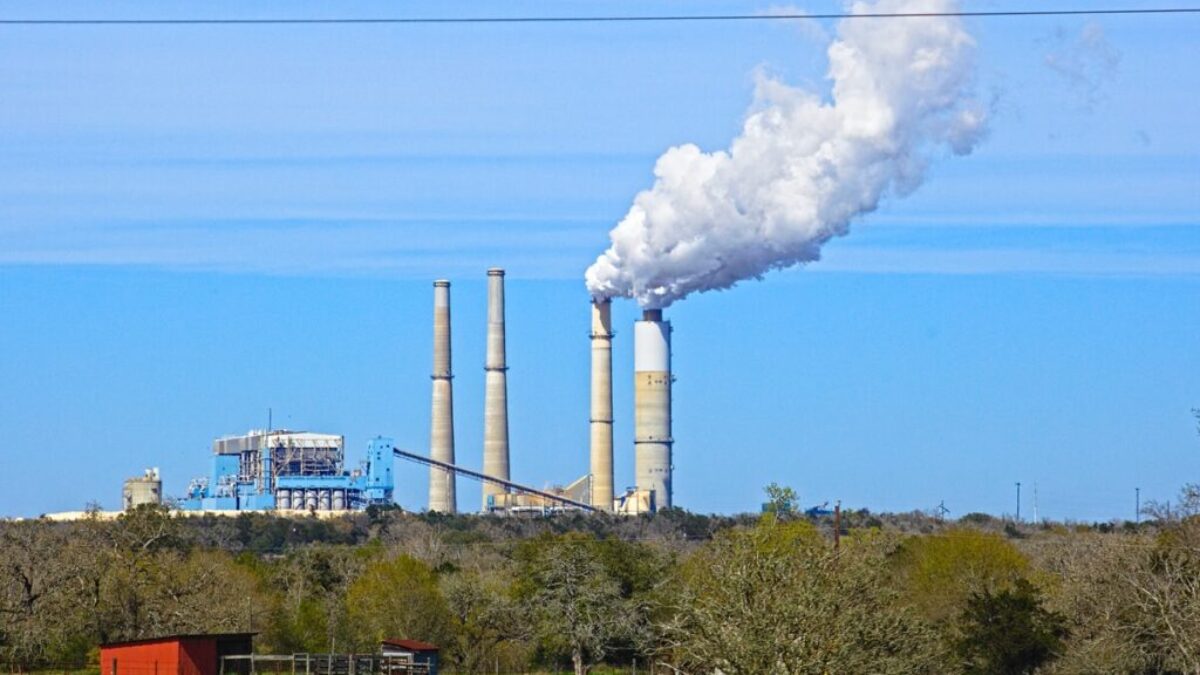 white smoke coming out from factory