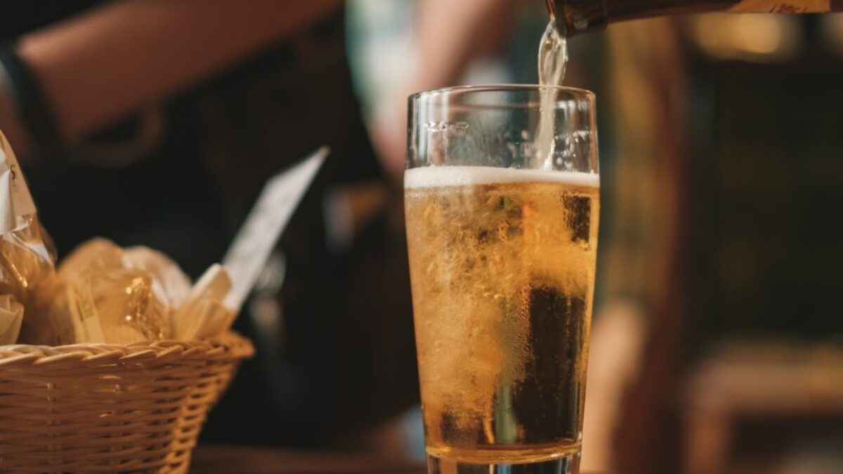clear drinking glass with beer