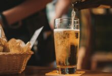 clear drinking glass with beer
