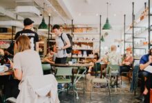 people eating inside of cafeteria during daytime