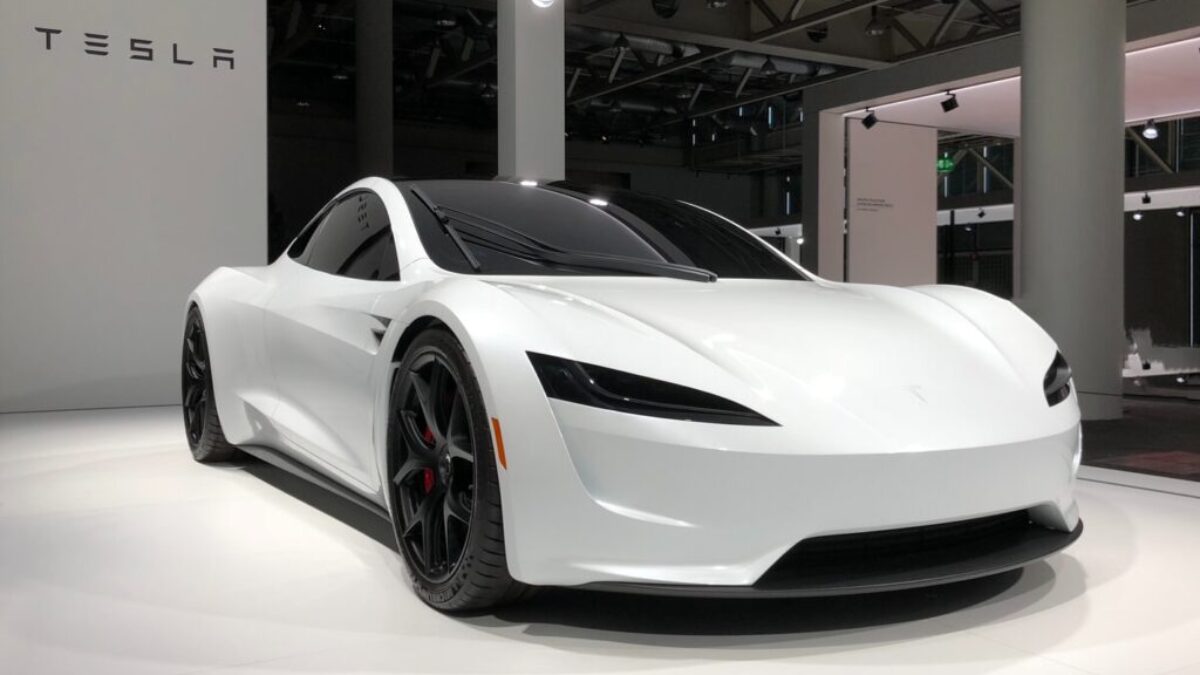 white lamborghini aventador parked in building