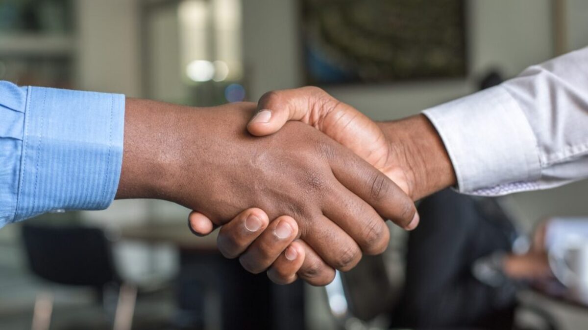 two people shaking hands