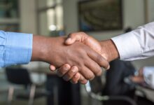 two people shaking hands