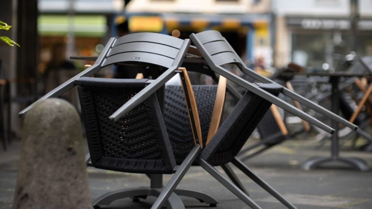 black and brown steel armchairs