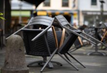 black and brown steel armchairs