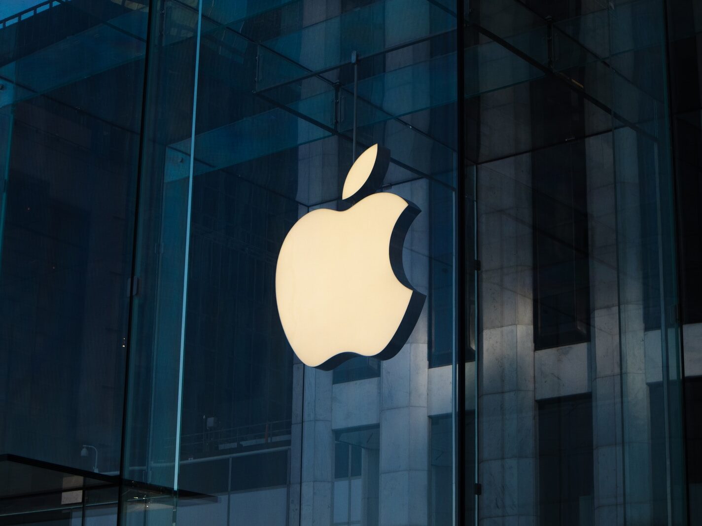 apple logo on glass window