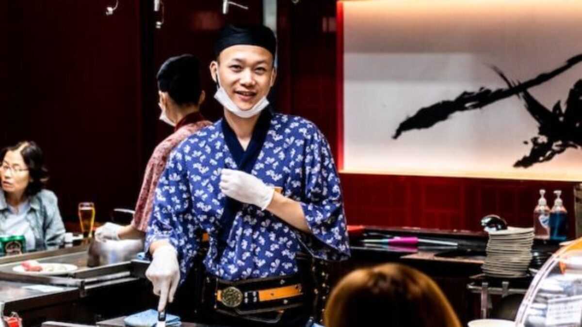 smiling man on counter