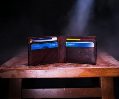 brown leather bifold wallet on table