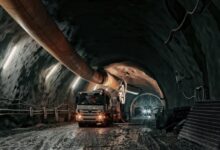 red and black truck in tunnel