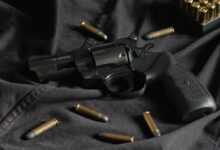 black and silver revolver pistol