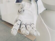 closeup photo of white robot arm