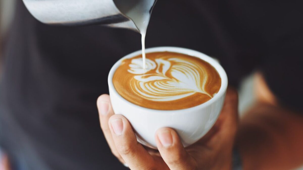 Person Performing Coffee Art