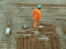 man walking on construction site