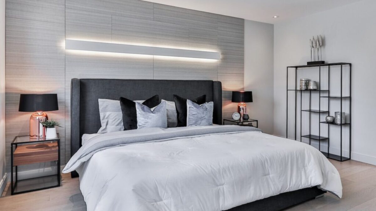 white bed linen on bed