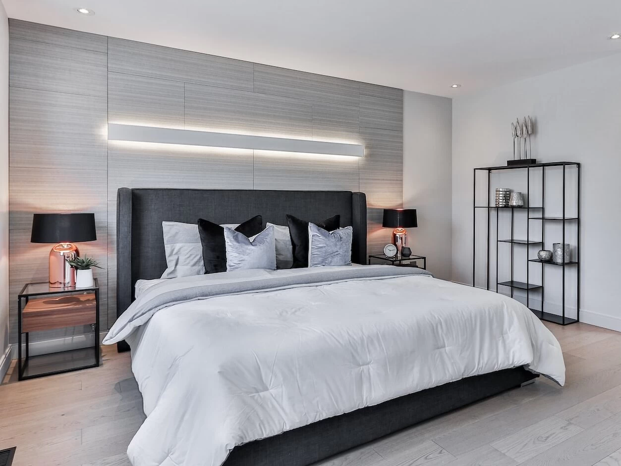 white bed linen on bed