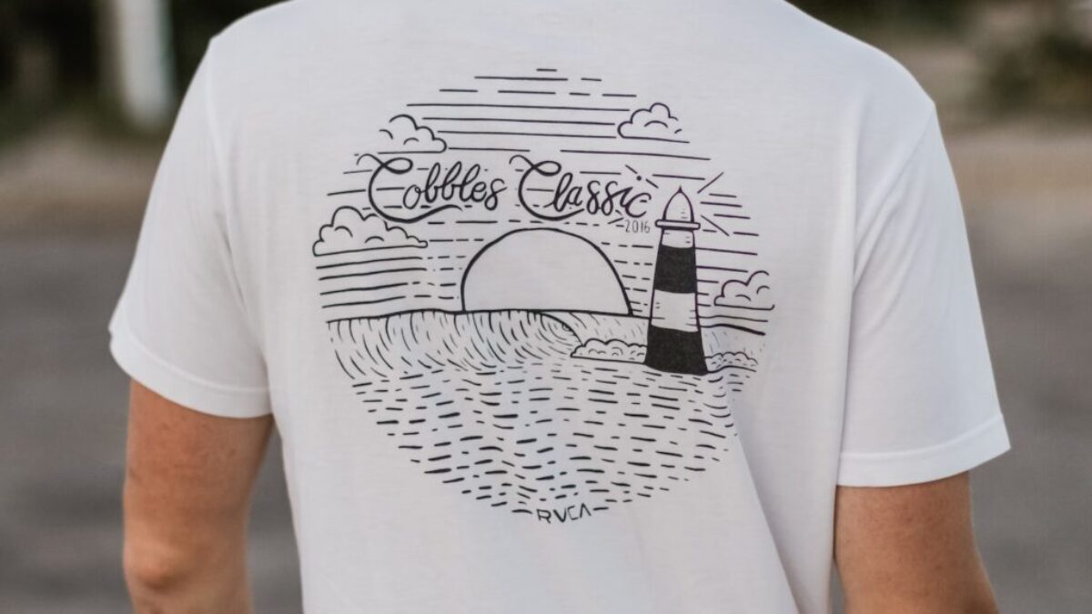 white and black t-shirt close-up photography