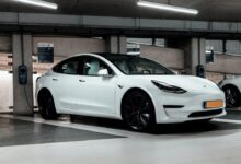shallow focus photo of white sedan