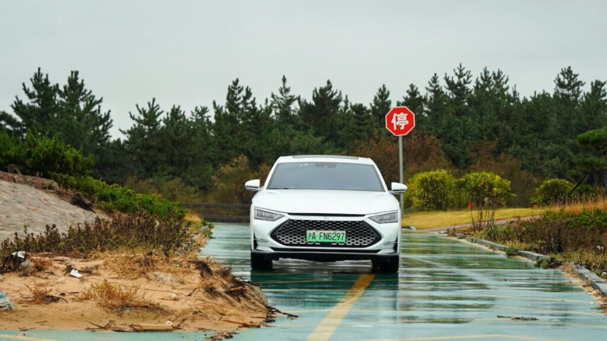 a car driving through a flooded road