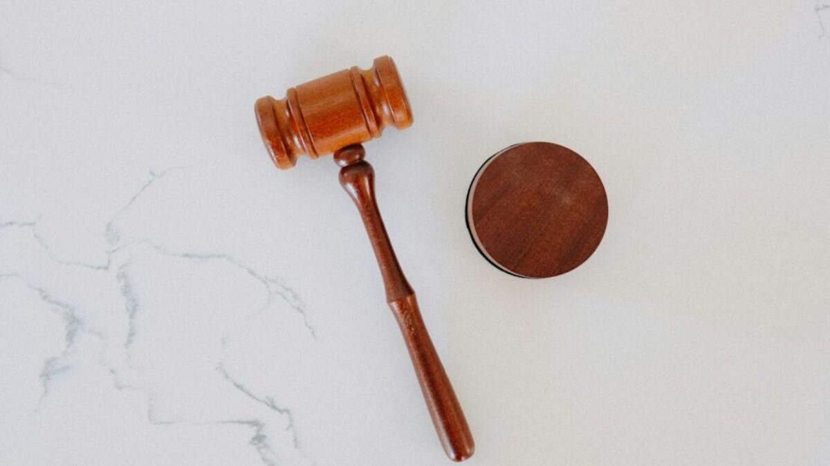 brown wooden smoking pipe on white surface