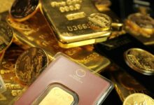 gold iphone 6 on gold round coins