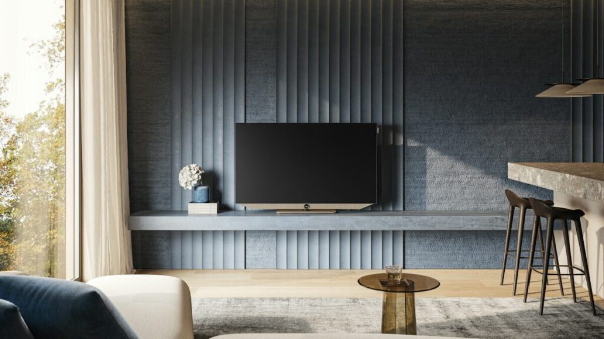 a living room with a couch a table and a tv