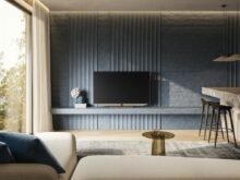 a living room with a couch a table and a tv