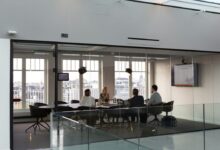people sitting on chair inside building