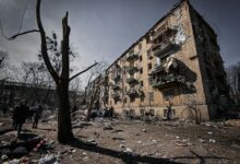 Destroyed Residential Building Under Gray Sky