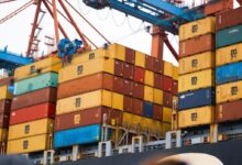 a large cargo ship loaded with lots of containers