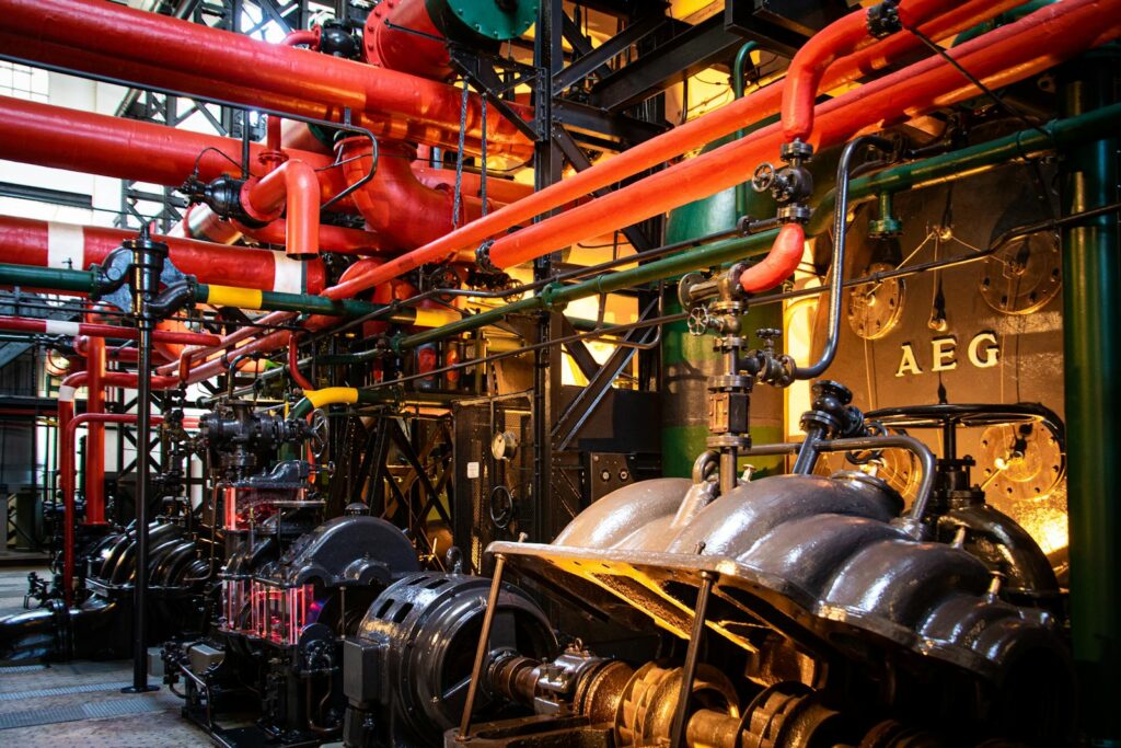 Photo by Magda Ehlers - ByznysDeník Gray and Red Industrial Machine