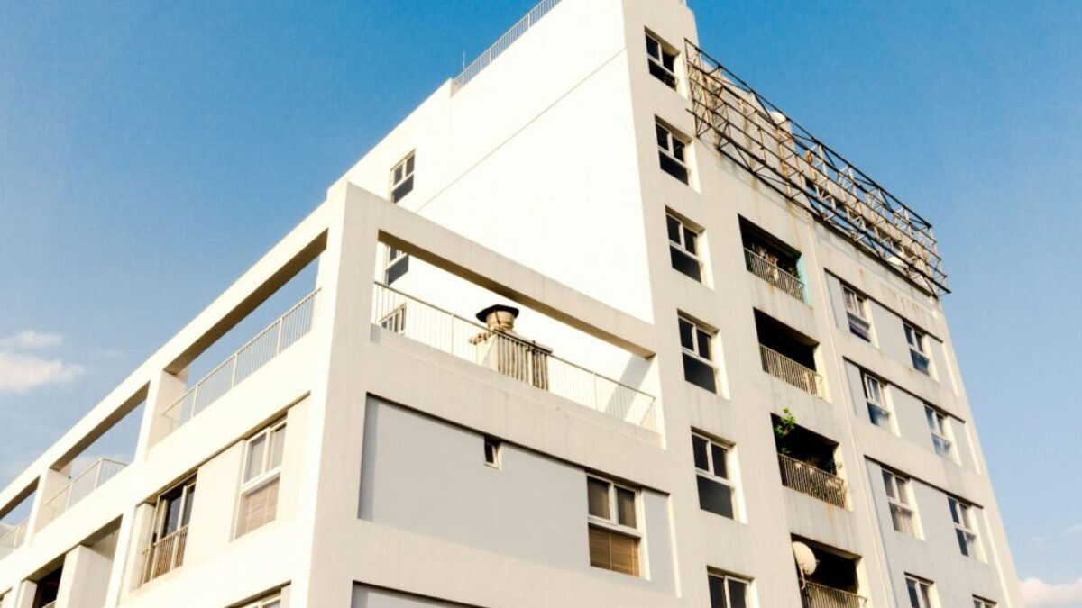white concrete building under blue sky during daytime