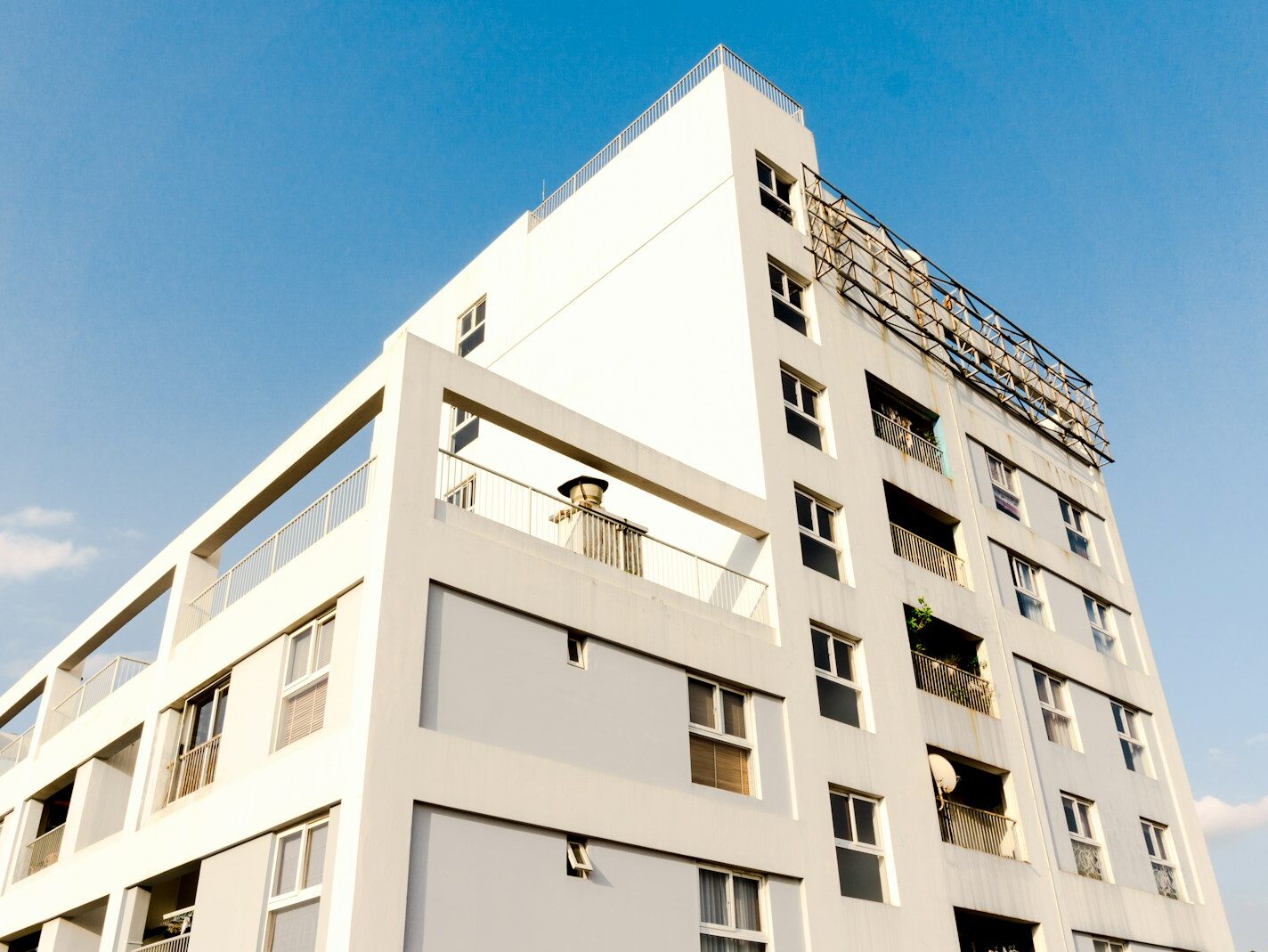 white concrete building under blue sky during daytime
