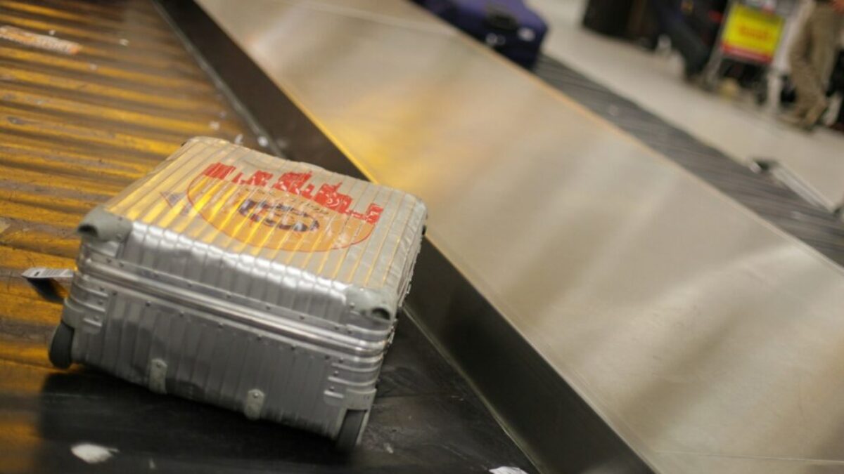 gray hardside luggage
