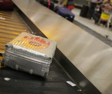 gray hardside luggage