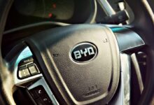 black vehicle steering wheel close-up photography