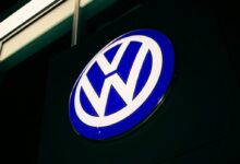 blue and white round b logo