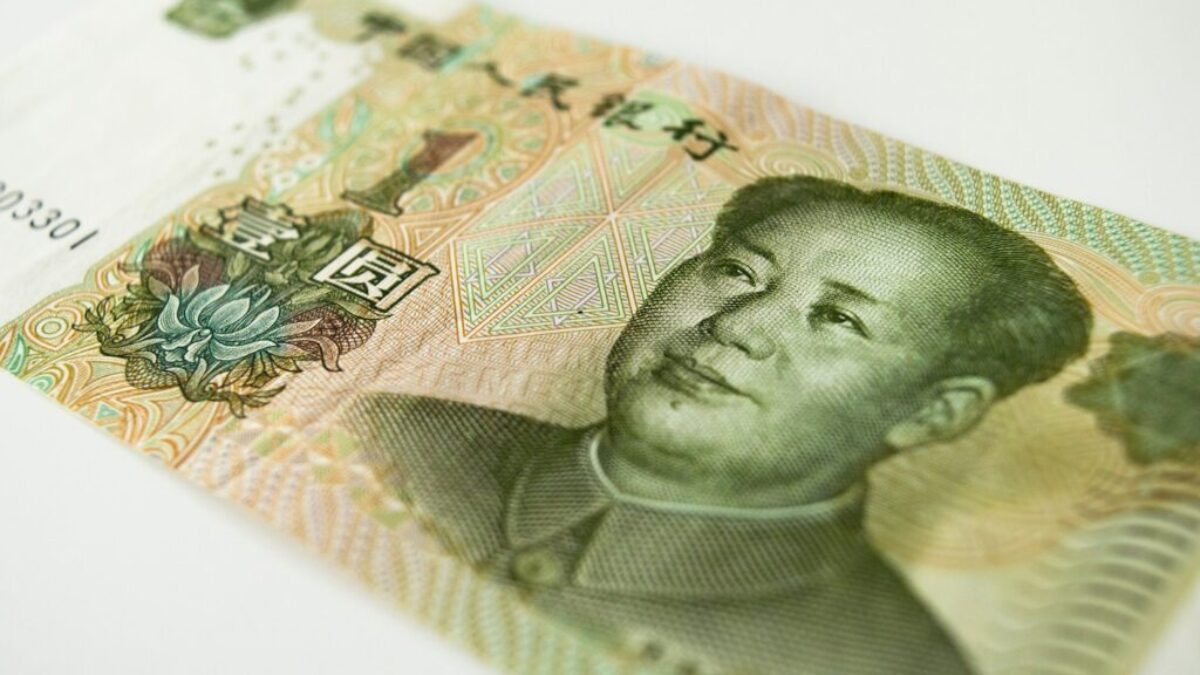 a close up of a bank note with a man's face on it