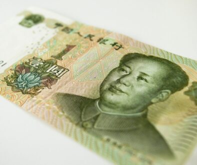 a close up of a bank note with a man's face on it