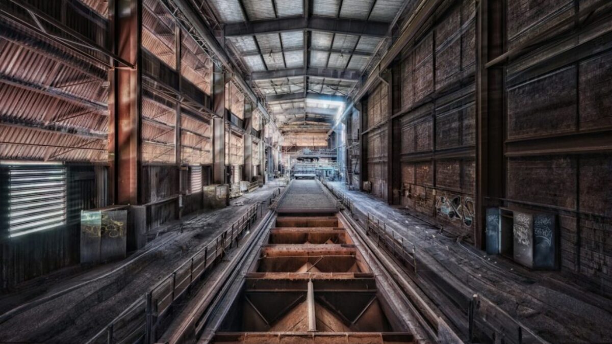 a long wooden staircase in a building