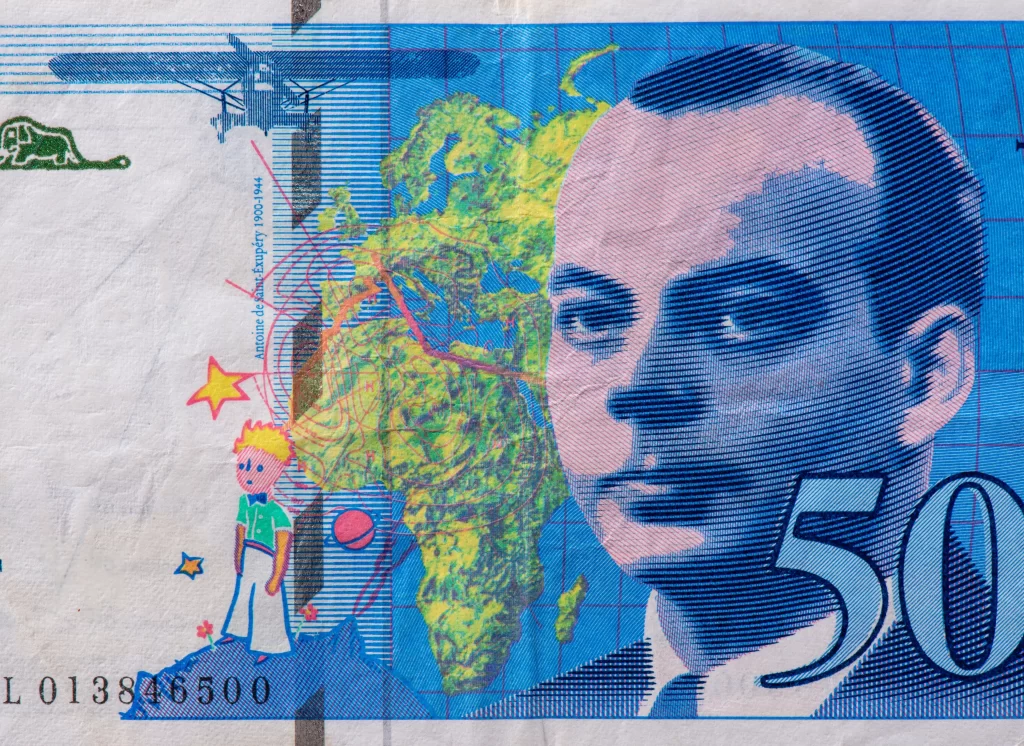 Francouzský spisovatel napsal i další díla. Zdroj: Shutterstock - ByznysDeník Spisovatel Malého prince na bankovce.